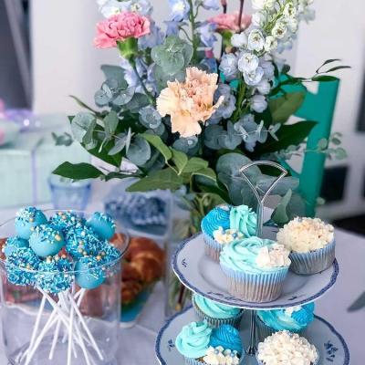 a bouquet of flowers in a vase on a table